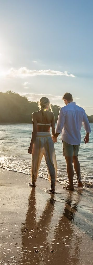 Romantic Honeymoon Image Couple enjoying honeymoon on a Caribbean Beach.