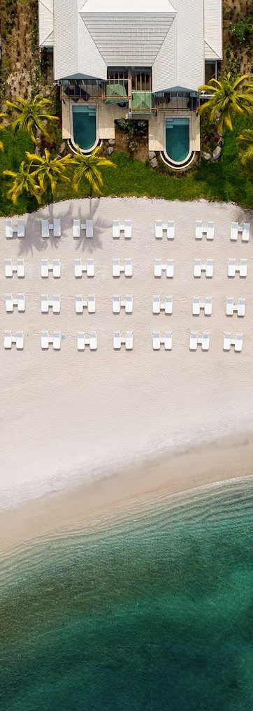 Luxury Beachfront for Honeymooners Crystal Clear Caribbean water with a white sand beach and luxury honeymoon villas